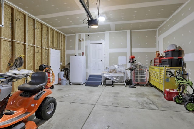 667 Green Forest Pl, Lithopolis, OH 43136 - garage with a garage door opener and water heater