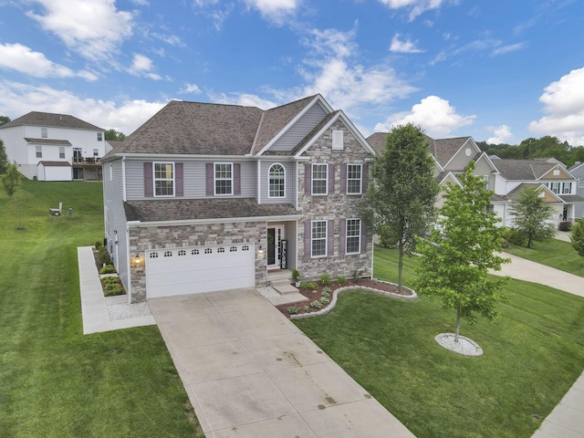 667 Green Forest Pl, Lithopolis, OH 43136 - view of front of house featuring concrete driveway, stone siding, a front lawn, and an attached garage