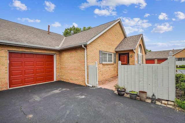 view of home's exterior with a garage