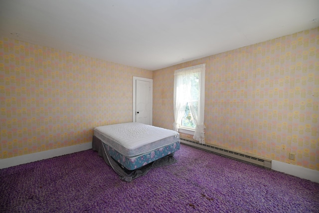 bedroom featuring carpet floors and baseboard heating