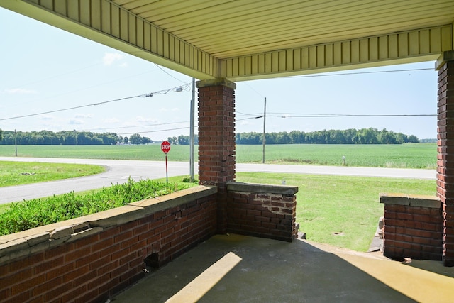 view of patio with a rural view