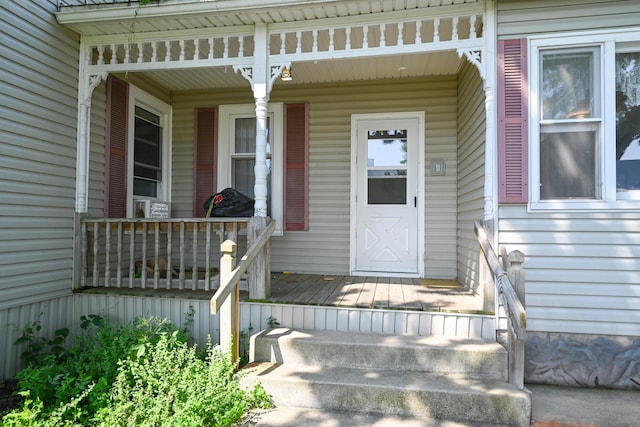 doorway to property with a porch