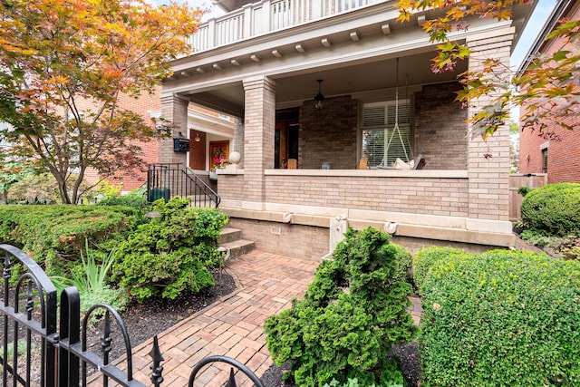 view of patio featuring a balcony