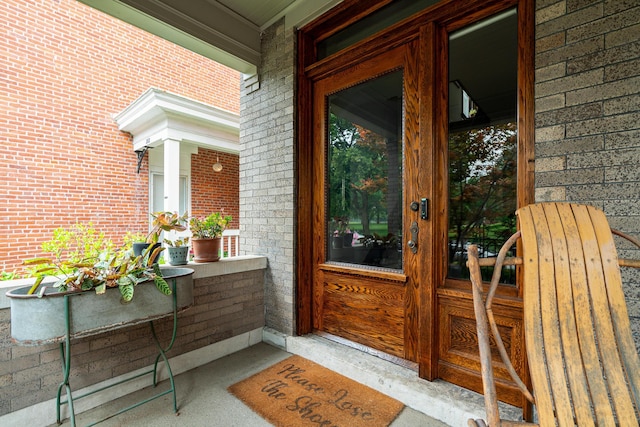 property entrance featuring french doors