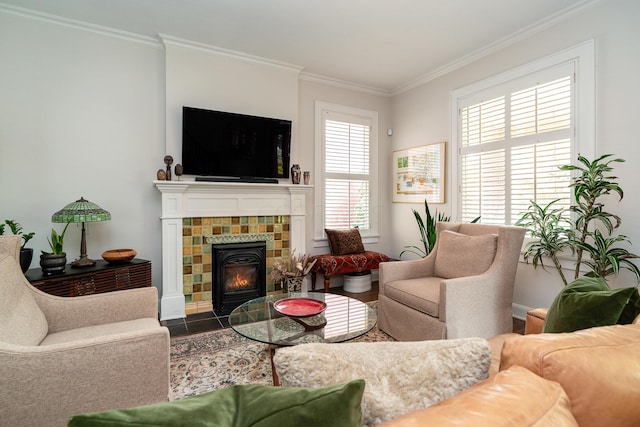 living room with ornamental molding and a fireplace