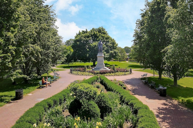 surrounding community featuring a yard