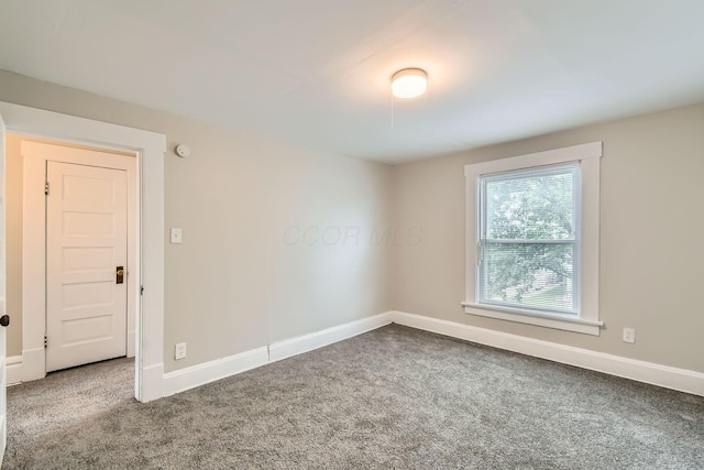 53 N Warren Ave, Columbus, OH 43204 - carpeted spare room with baseboards