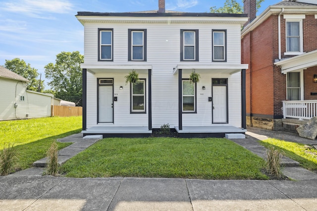 view of front of home with a front lawn