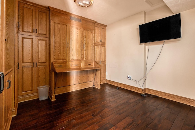 interior space with dark wood-type flooring