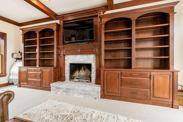 living room featuring beamed ceiling, carpet, a brick fireplace, and ornamental molding