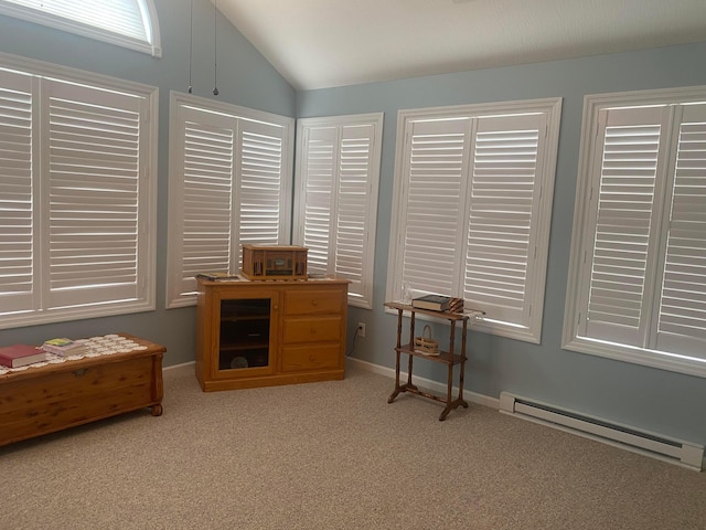 misc room featuring baseboard heating, light colored carpet, and lofted ceiling