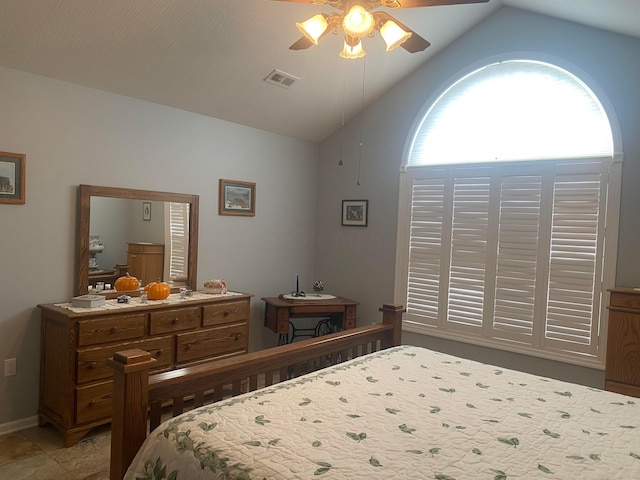 bedroom featuring ceiling fan and lofted ceiling