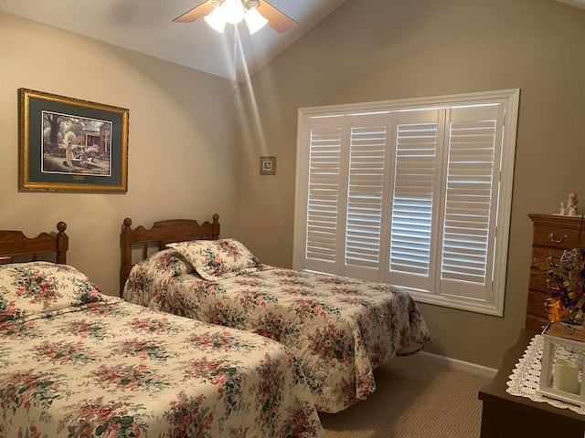 bedroom with carpet, ceiling fan, and lofted ceiling