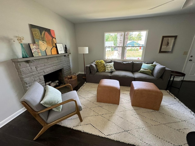 living room with a fireplace and light hardwood / wood-style floors