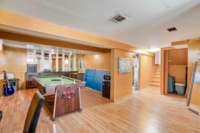 recreation room with light wood-type flooring and billiards