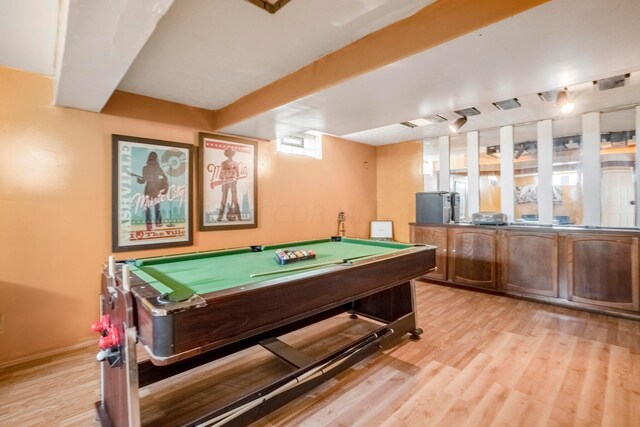 recreation room with light wood-type flooring and billiards