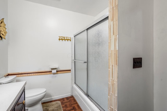 full bathroom with toilet, vanity, bath / shower combo with glass door, and parquet flooring