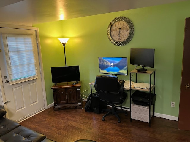 office with dark hardwood / wood-style floors