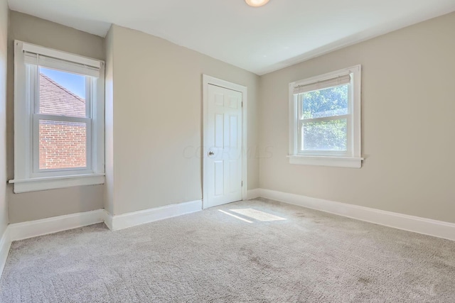 75 N Huron Ave, Columbus, OH 43204 - unfurnished bedroom with carpet flooring and a closet