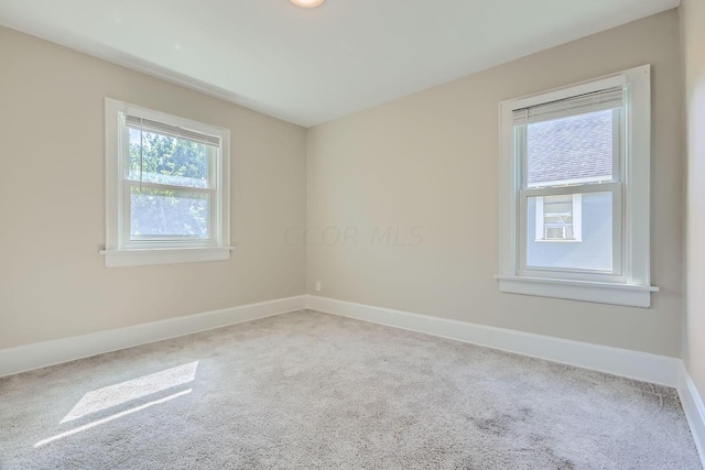 75 N Huron Ave, Columbus, OH 43204 - carpeted empty room with baseboards