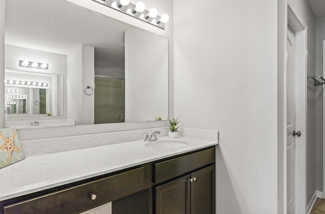 bathroom featuring vanity and walk in shower