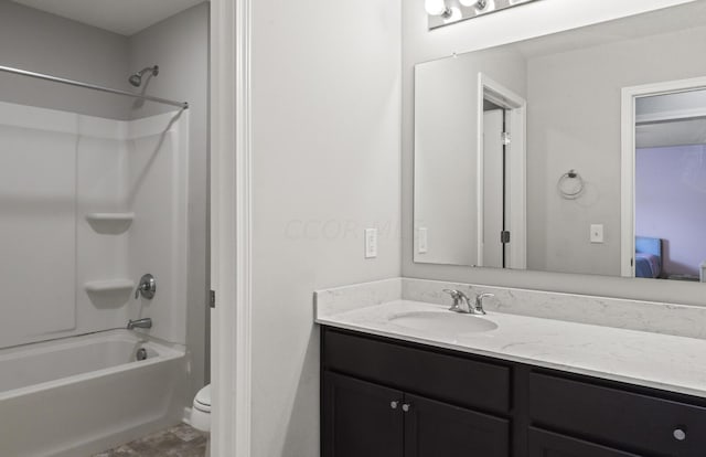 full bathroom featuring vanity, toilet, and shower / tub combination