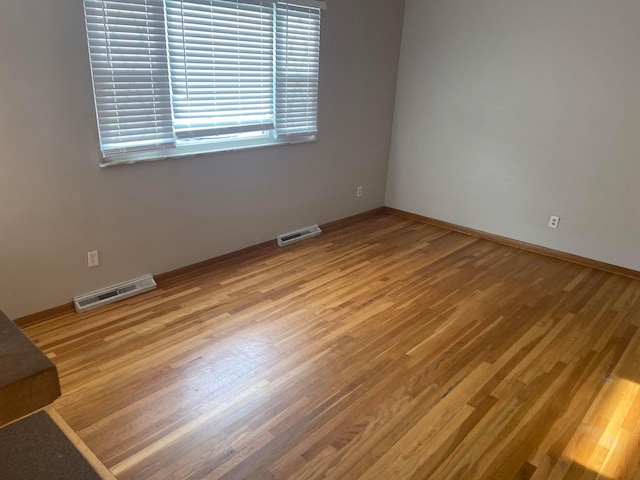 empty room featuring light hardwood / wood-style flooring