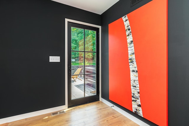 entryway with light wood-type flooring