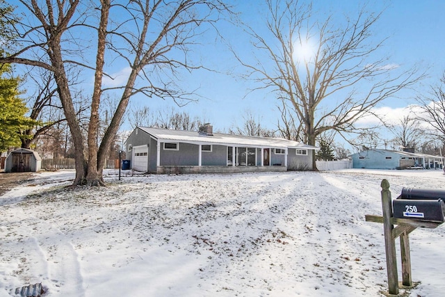 ranch-style home with a garage