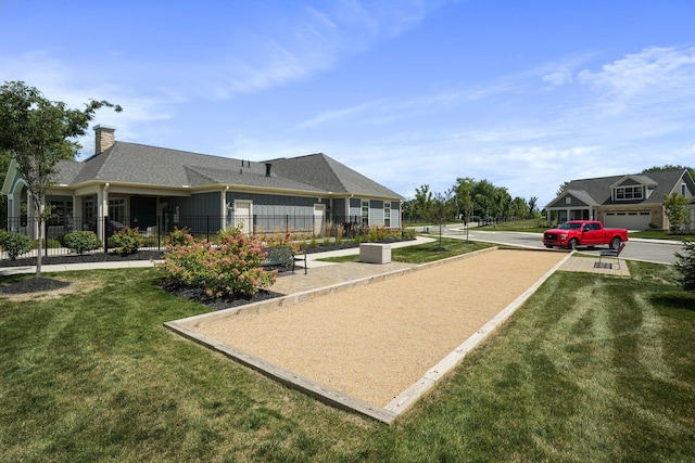 view of community featuring a lawn