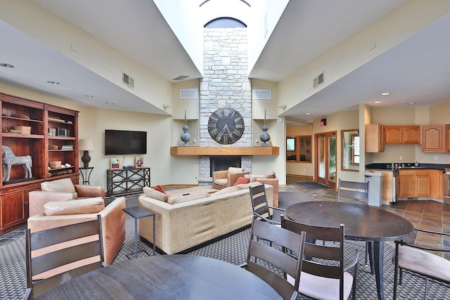 living room featuring a fireplace