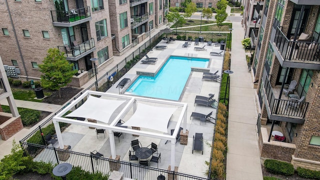 view of swimming pool featuring a patio