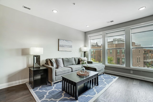 living room featuring dark hardwood / wood-style floors