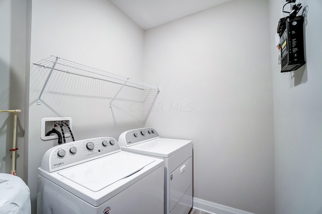 laundry room with washer and clothes dryer