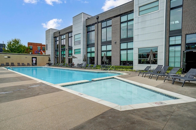 view of pool with a patio area