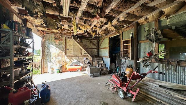 miscellaneous room with concrete flooring