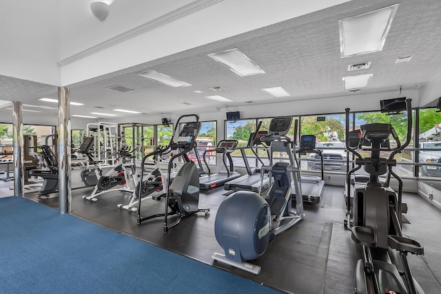 gym with a textured ceiling