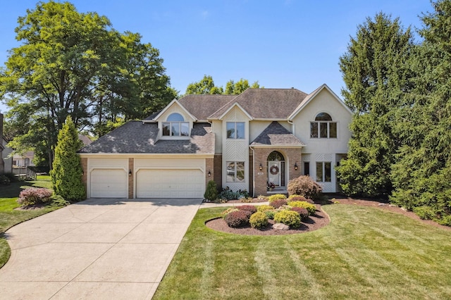 view of front of house featuring brick siding, a shingled roof, a front yard, a garage, and driveway