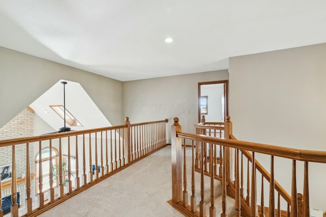 hall featuring recessed lighting and carpet