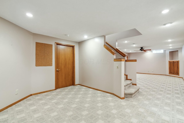 finished basement with recessed lighting, baseboards, and carpet flooring