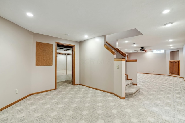 finished basement with stairway, recessed lighting, baseboards, and carpet floors