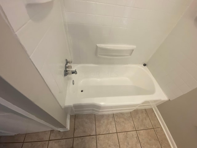 bathroom with bathing tub / shower combination and tile patterned flooring