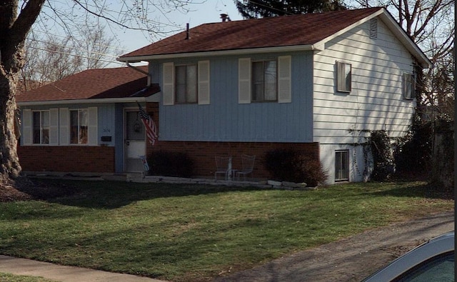 view of property exterior featuring a lawn