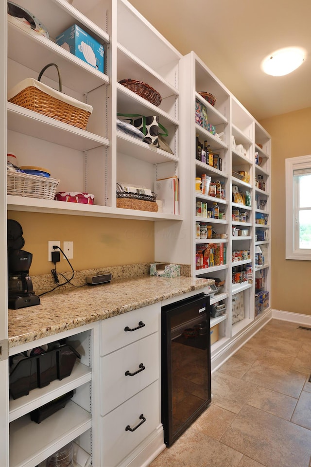 pantry featuring wine cooler