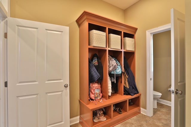 mudroom with light carpet