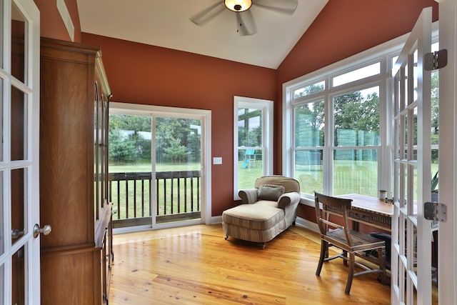 sunroom with french doors, vaulted ceiling, and ceiling fan