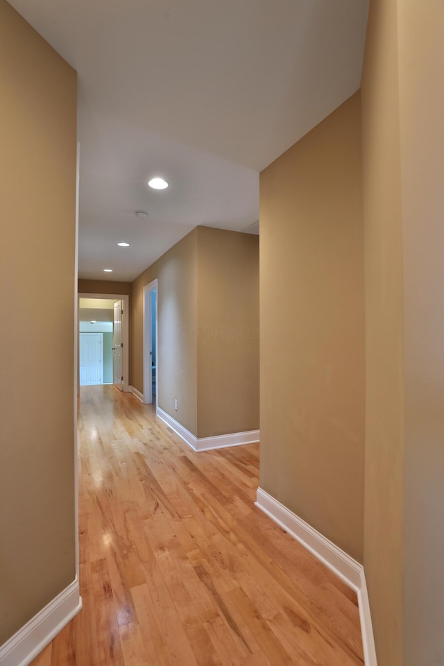 corridor featuring light hardwood / wood-style flooring