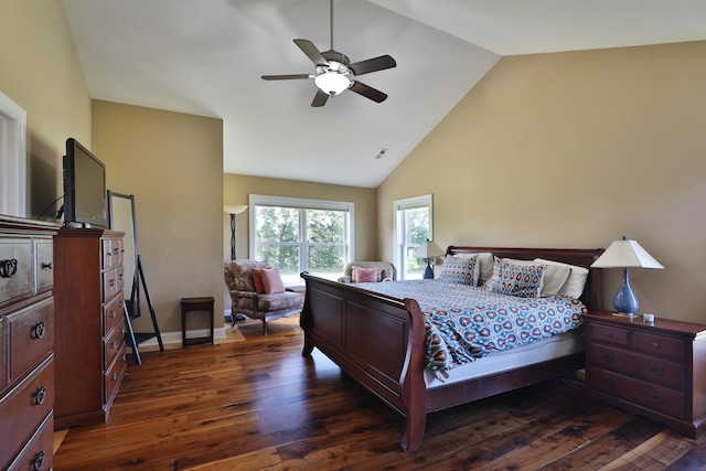 bedroom with dark hardwood / wood-style floors, high vaulted ceiling, and ceiling fan