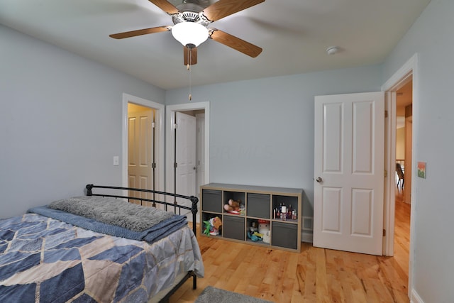 bedroom featuring ceiling fan and wood-type flooring