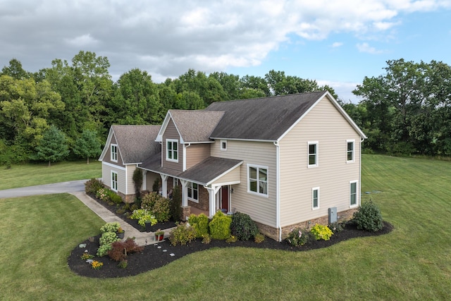 view of front of home with a front yard